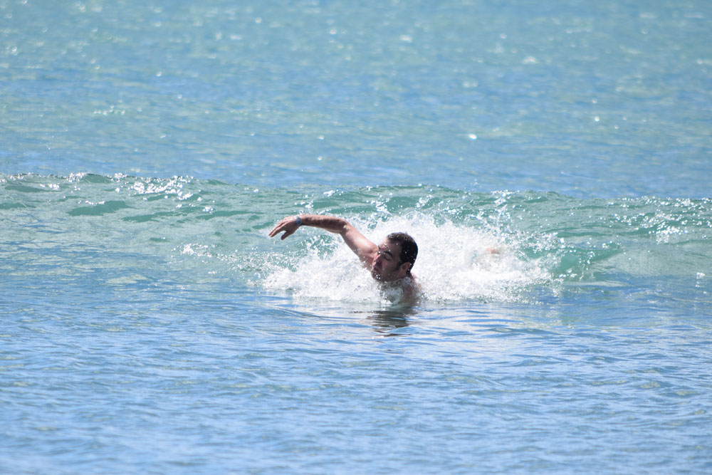 Nick swimming at Orewa Beach